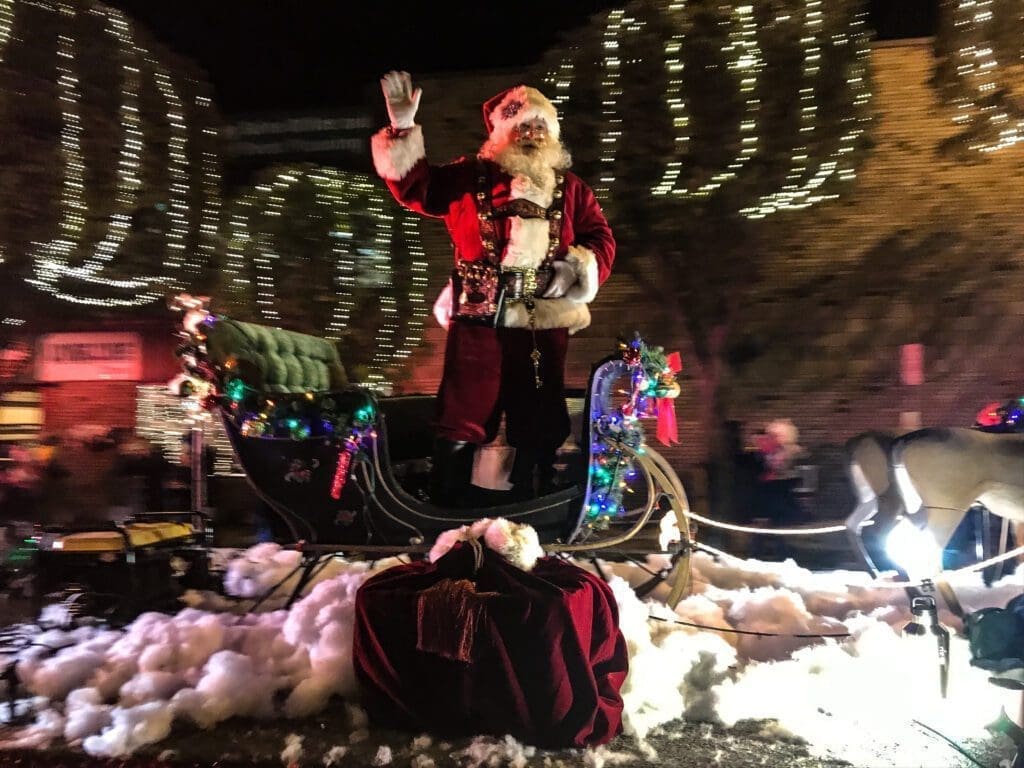 Santa on a float inn a parade.