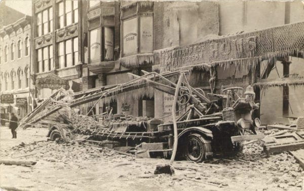 A historic photo of a 1917 fire in a business district.