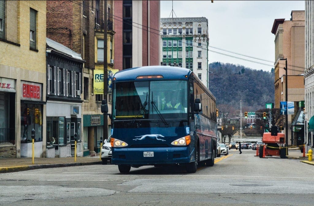 The bus is blue.