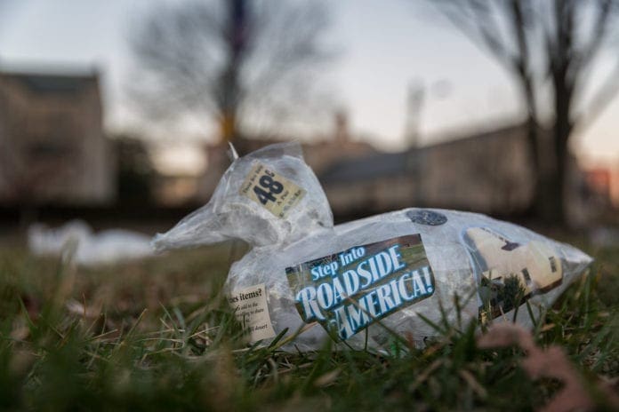 A photo of litter along a roadside.