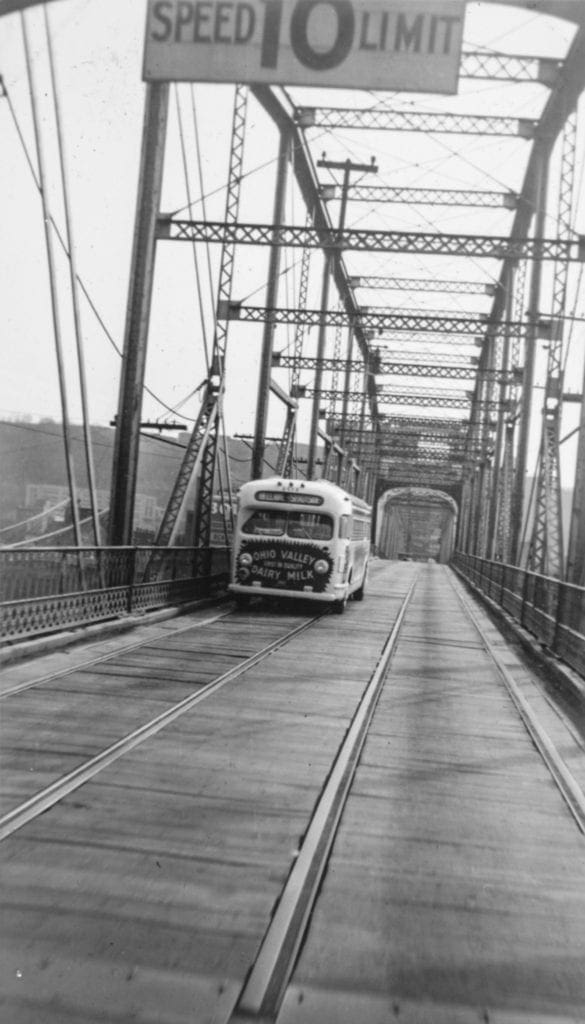 A trolley crossing a bridge.