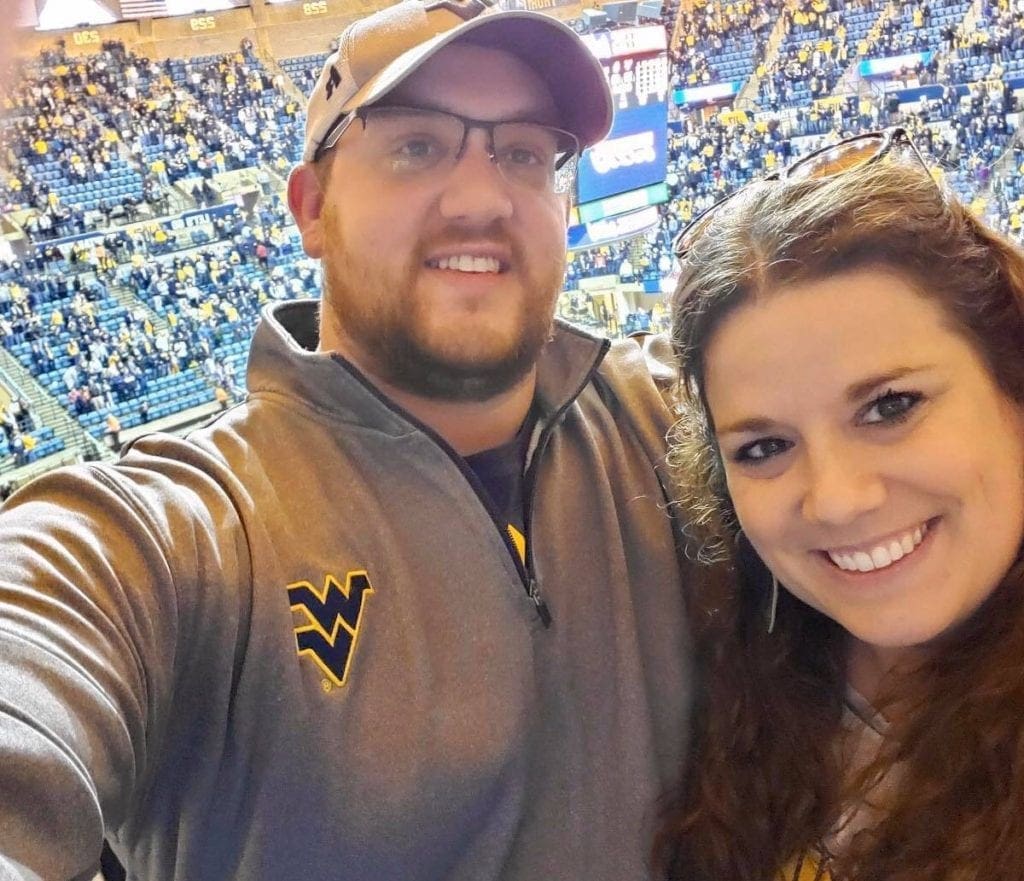 A husband and wife in a selfie.