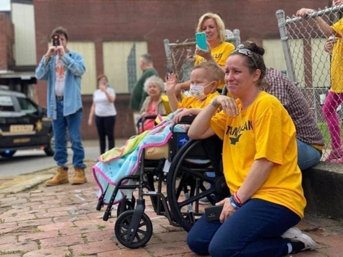 A child and his mother.