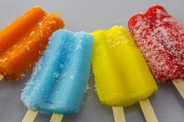 A rainboww of popsicles.