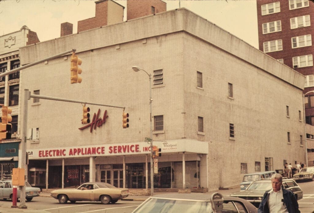 A color photo of a street corner.