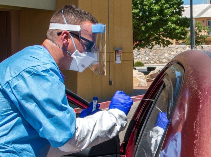 A doctor doing a test.