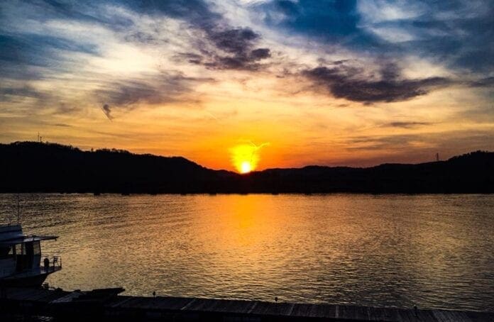 A photo of a sunset over a river.