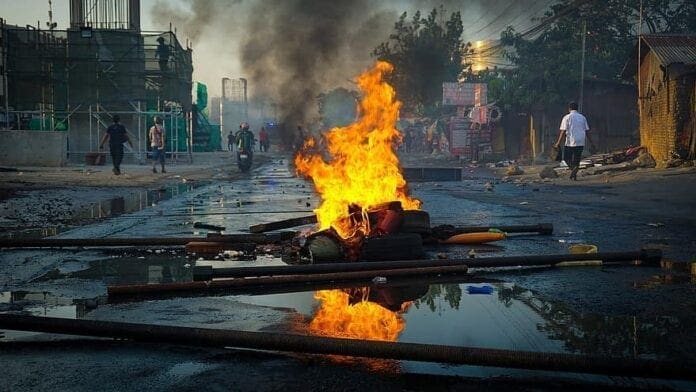 A fire in the middle of a street.