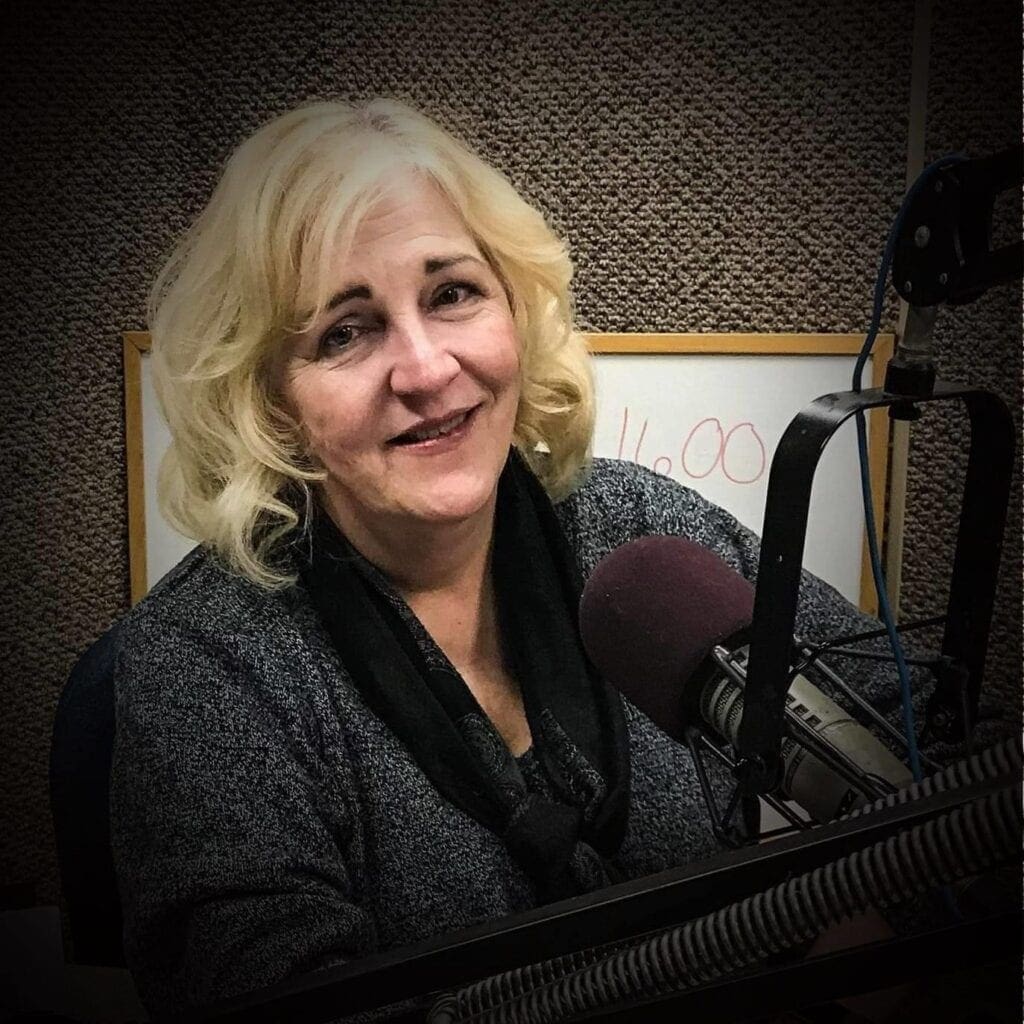 A photo of a lady on the radio.