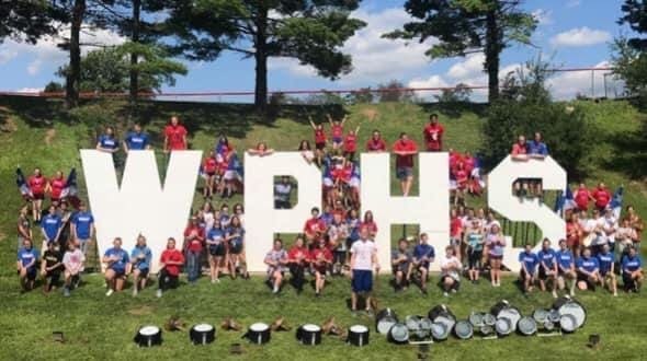 A band posing by WPHS.