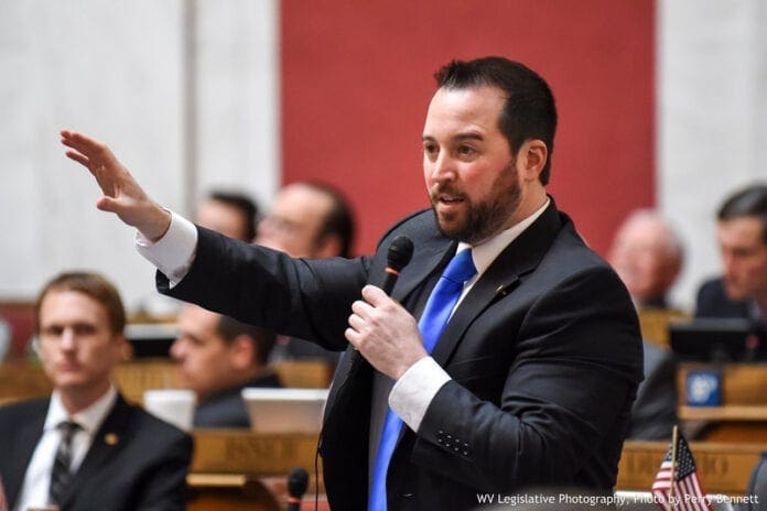 A Shawn Fluharty using body language during a speech.