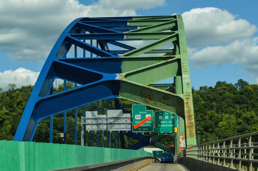 A bridge that is only half painted.