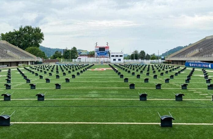 A football field with chairs on it.