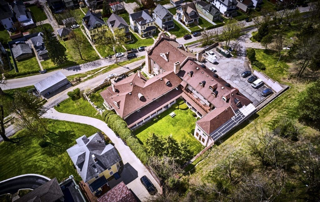 A drone shot of a large building.