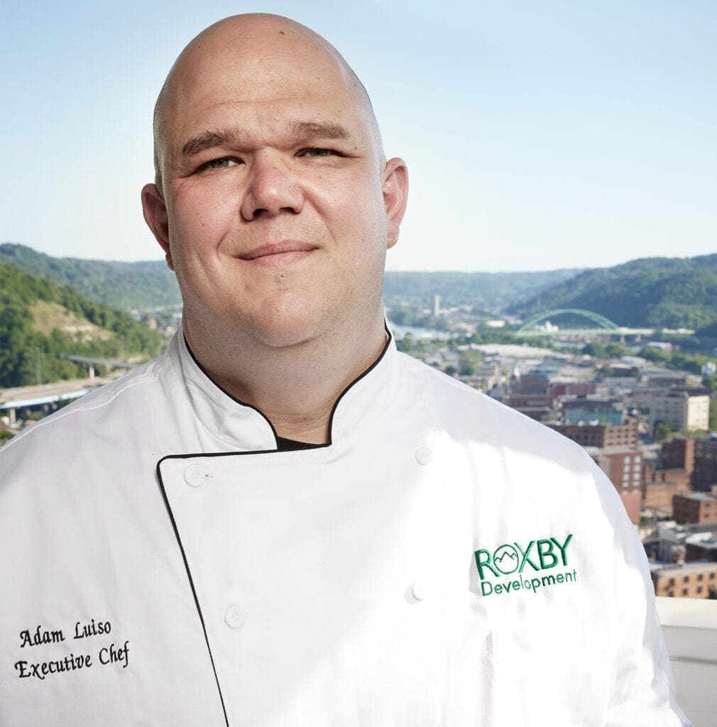 A man posing for a photo.