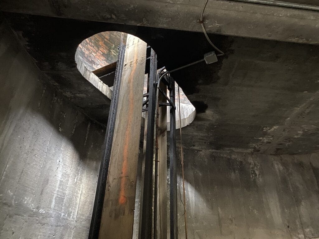 A lift through a ceiling.