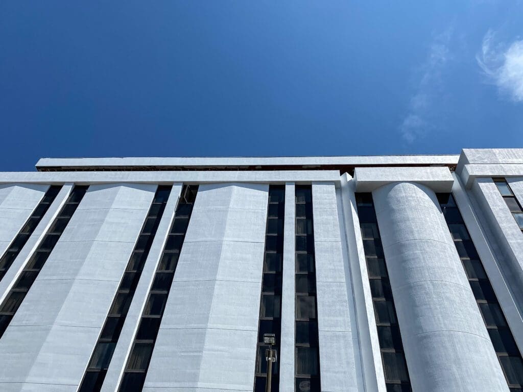 A photo of the front of a tall building.