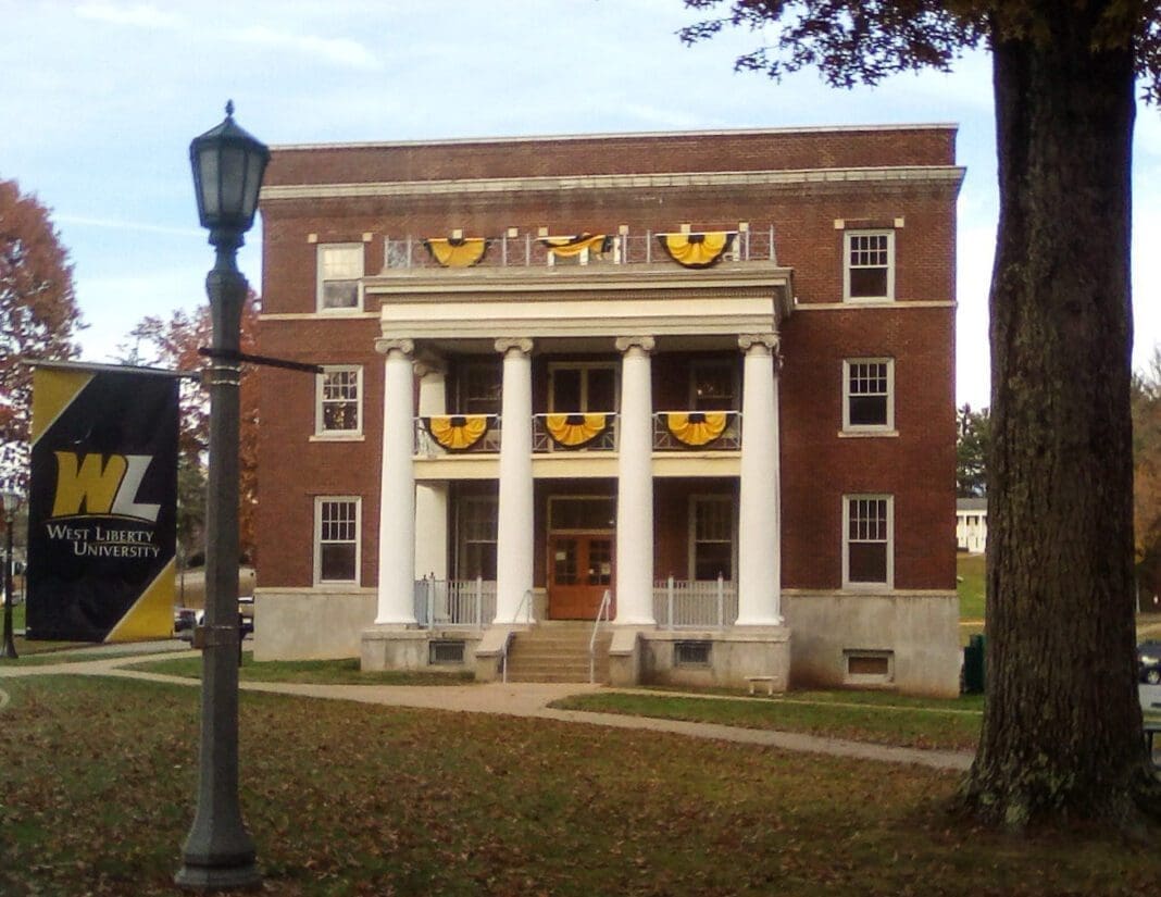 A photo of a large college building.