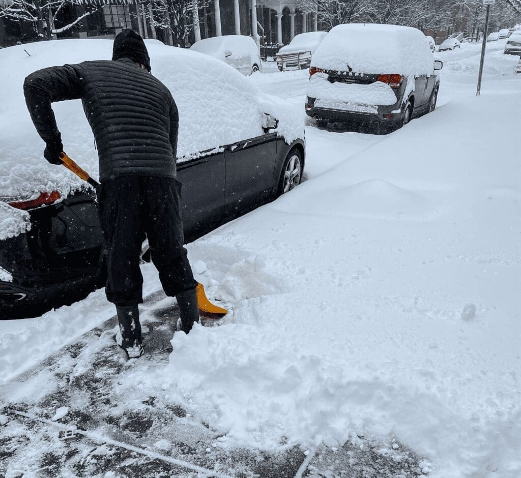 A person shoveling snow.