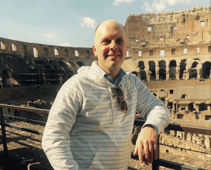 A man posing for a photo.