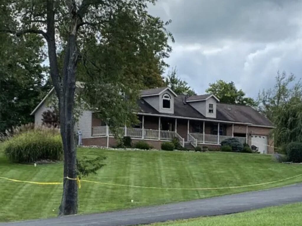 A nice house on a hill.