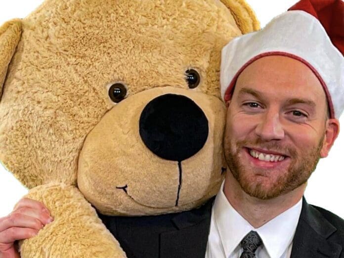 F8CF94A7-C0D9-496B-B1A9-57ECED35D347 A man with a Teddy Bear,