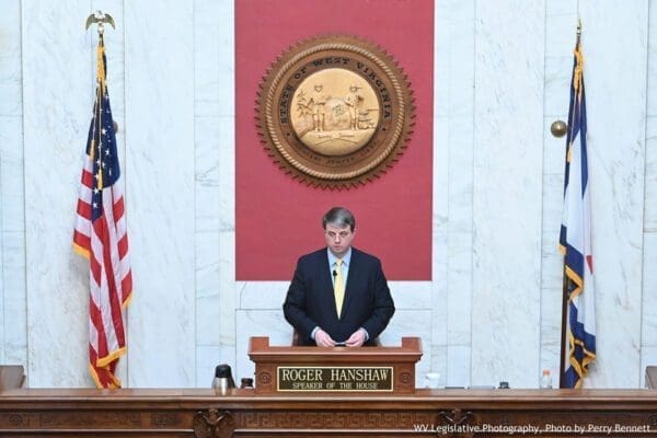 A man in the middle of the room.