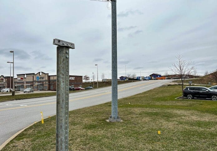 5B86B363-BDAC-470D-9EF8-6F40D4DF79F5 A sign pole.