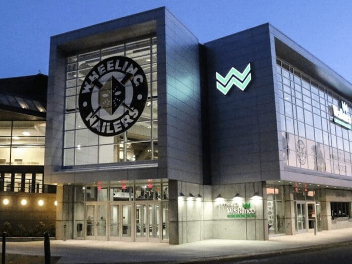 78DB265D-6B10-43A3-83EB-E60AE56D8F76 An arena at night.