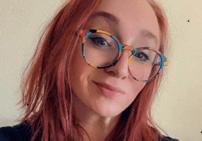 8F881AB8-8A5A-4C4B-8143-FC6BED1C8651 A smiling lady.