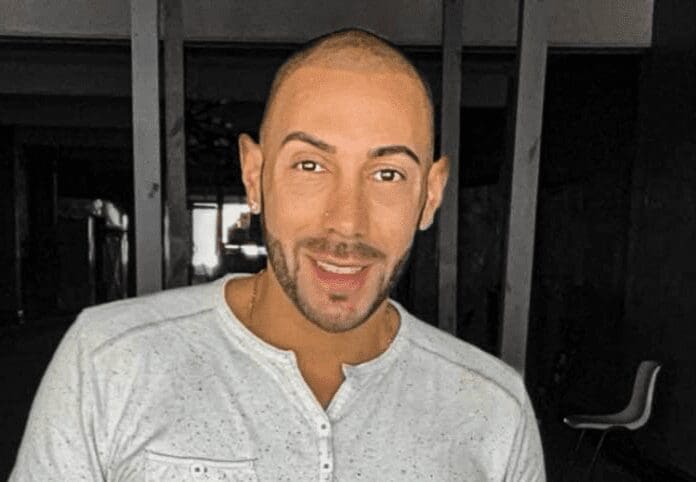 EC260E25-4A11-4C1A-8D72-607E3D4232FC A smiling man.