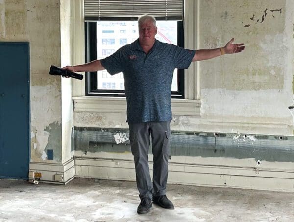 A man with his arms stretched out.