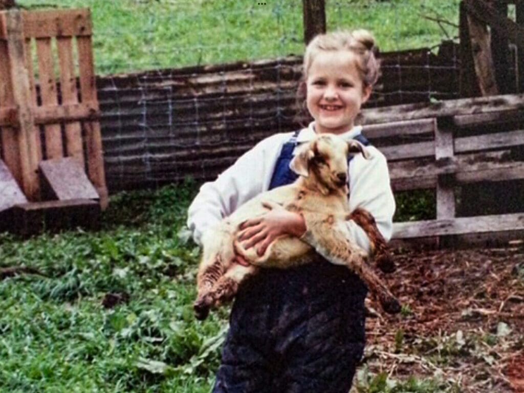 A young girl on a farm.