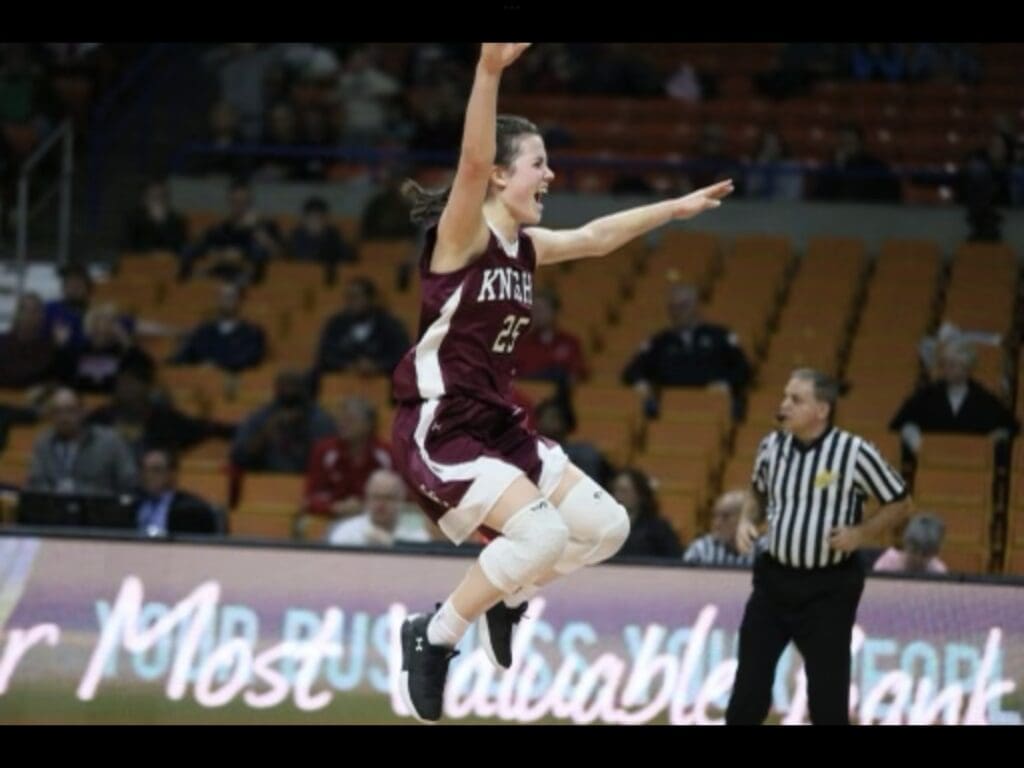 A lady jumping.