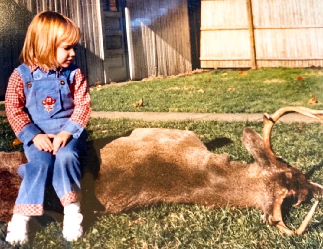 A girl with a deer.