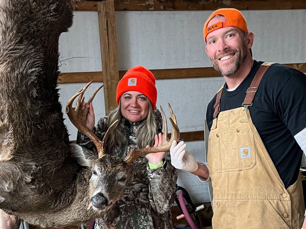 A woman and a buck.