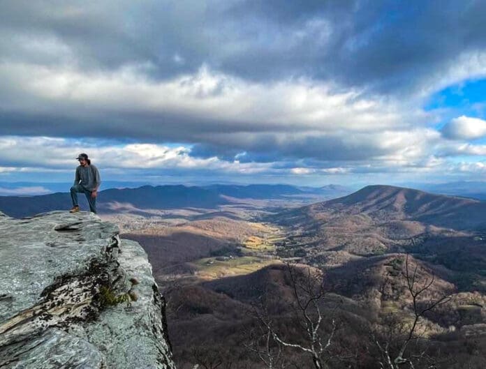 A8E2525C-6C6E-4B12-93A0-5608DE4CDA02 A man on a rock.