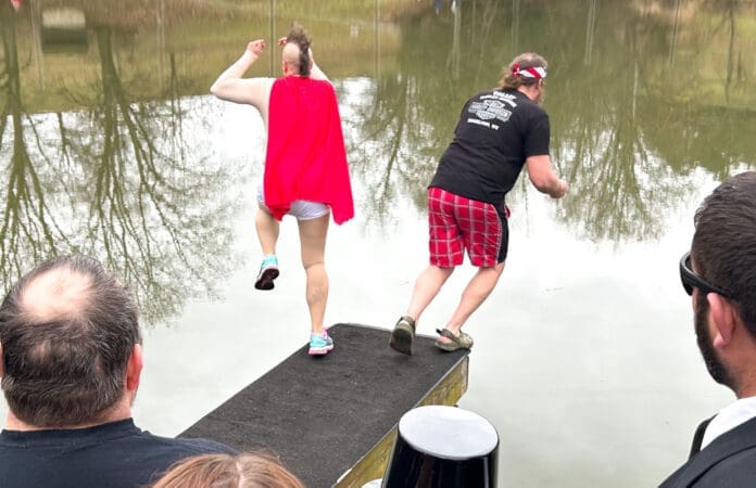 E1C3C672-CCBD-4219-A20F-BD581330DC66 Two people jumping.