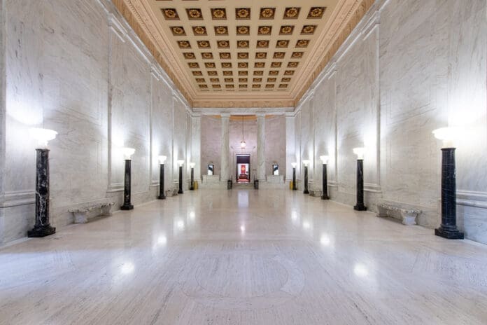 A long marble hallway.