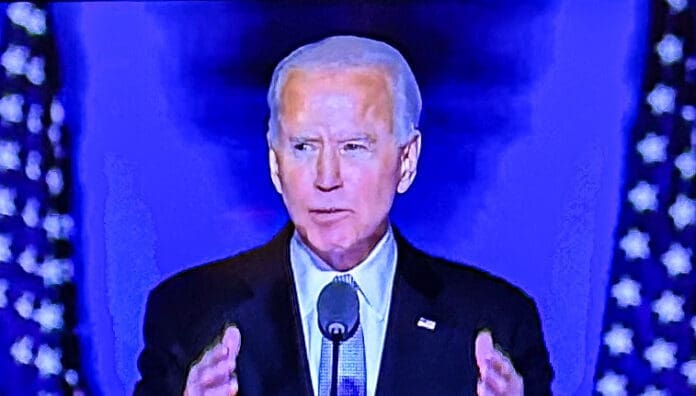 E9C9F7D4-9226-40A3-92C1-C58FD07F8961 A man on TV.