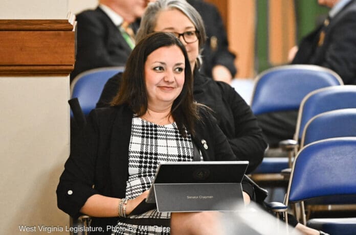 Screenshot A lady smiling.