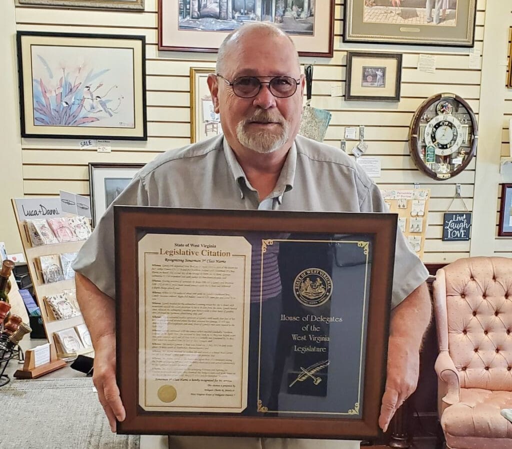 A man with a plaque.