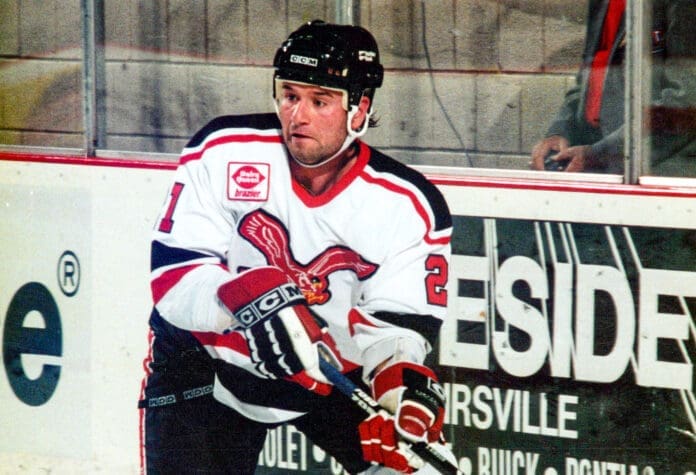 E582DEDC-7AB8-4CCA-AAE1-5442CA17ADE2 A hockey player.