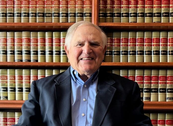 A smiling man who prosecuted the mob.