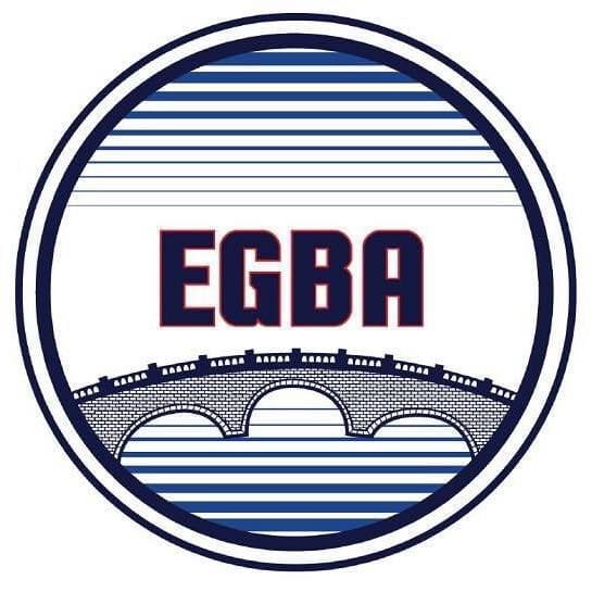 Elm Grove business association logo with initial and a bridge