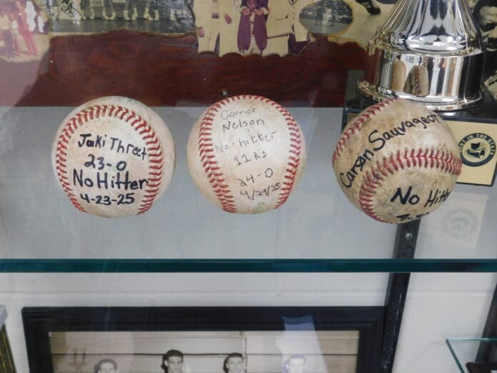 Three baseballs.