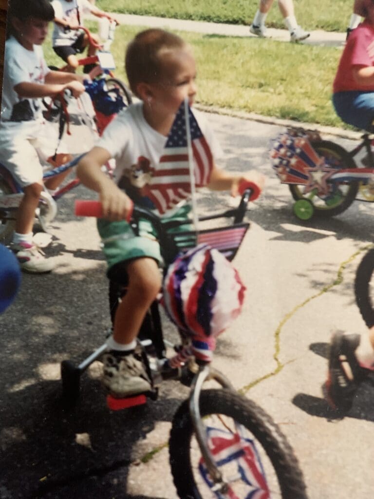 A kid on a bike.