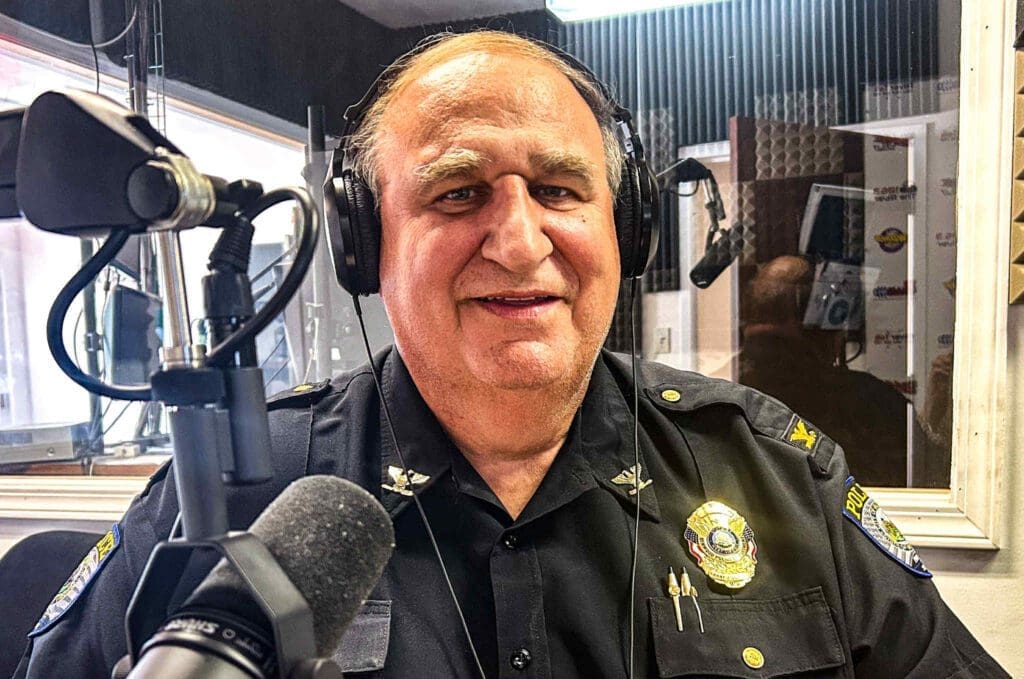 A man with headphones on.