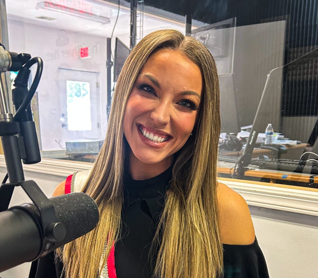 A woman with a microphone.