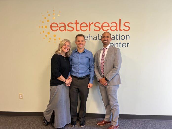 Mosmans and Eric Three people.